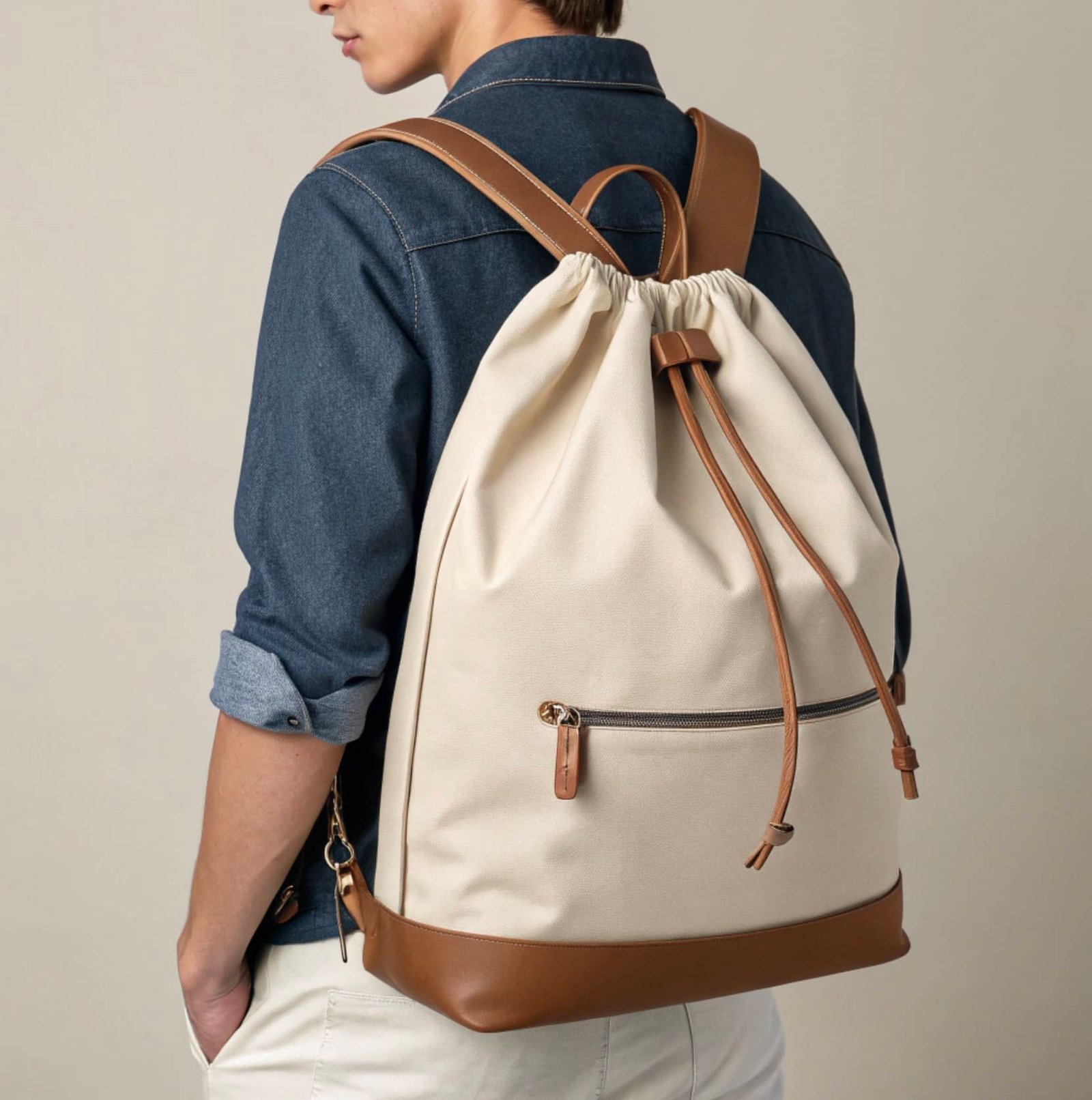 Stylish drawstring backpack with leather accents, modern casual design
