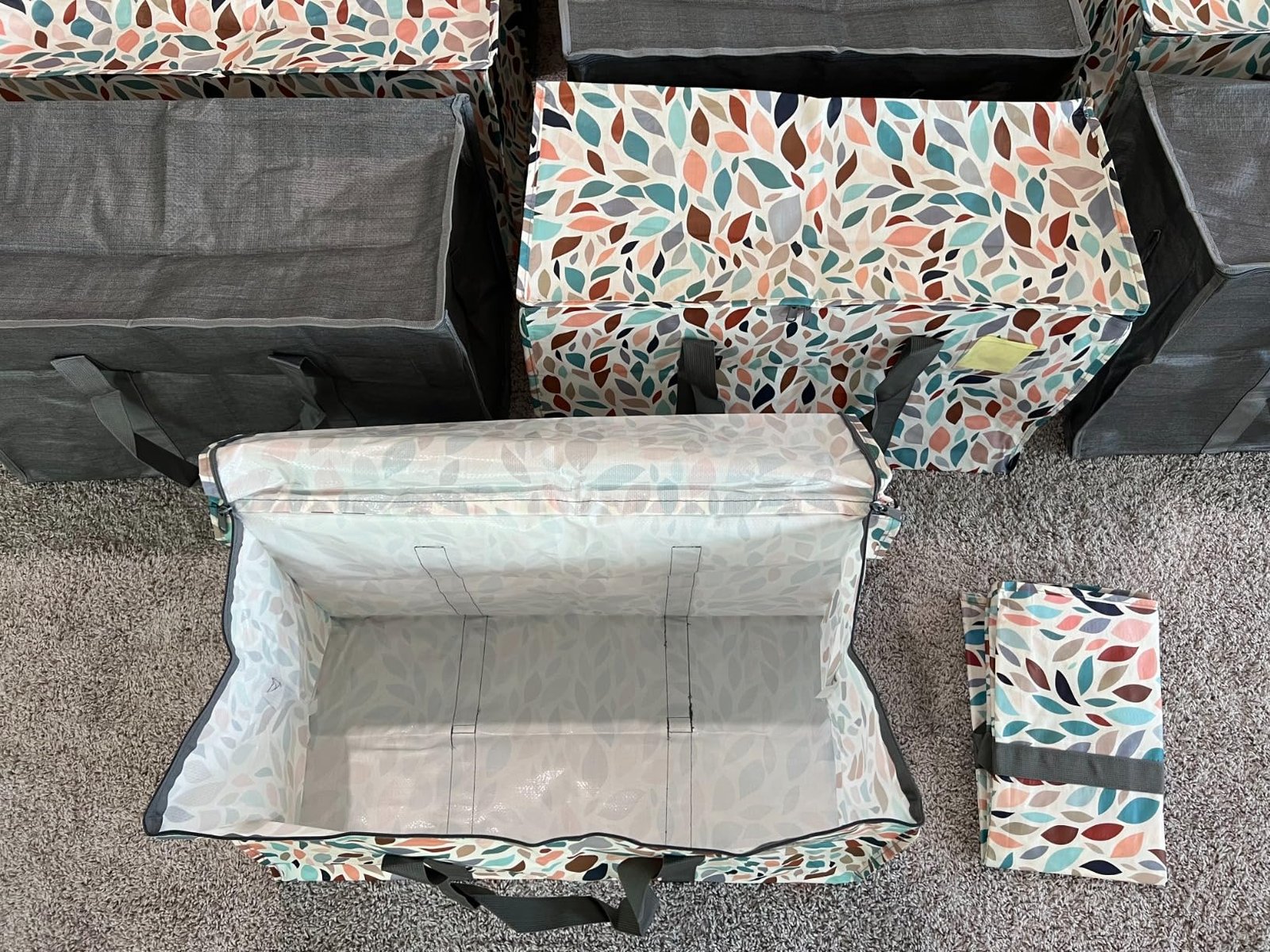 Foldable patterned storage bags with leaf design, open and folded views shown