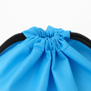 Close-up view of a blue insulated lunch bag with drawstring closure, ideal for secure food storage and takeaway packaging.