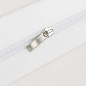 Close-up view of high-quality zipper closure on custom canvas tote bag for secure storage