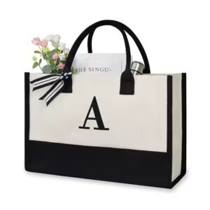 Personalized canvas tote bag with black trim and letter 'A' monogram, ideal for retail promotions, events, or corporate branding.