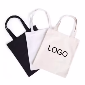 Plain canvas tote bag in black and white with customizable logo print for corporate giveaways and retail promotions