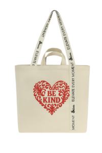 Beige canvas tote with red decorative heart and 'Be Kind' message, sustainable and reusable for shopping or promotions.