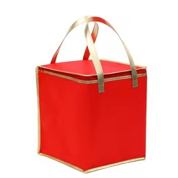Red insulated cooler bag with gold handles Red reusable insulated lunch tote bag with gold handles, ideal for food delivery, picnic use, and thermal preservation.