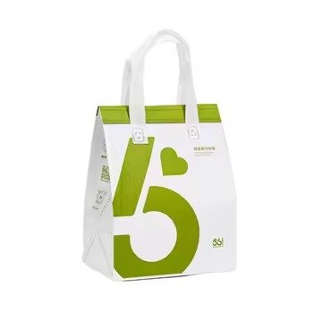 White reusable insulated tote bag with green printed design and handles, ideal for food delivery, takeaway packaging, and promotional use.