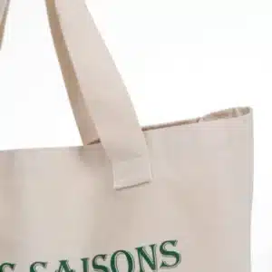 Close-up of cotton tote bag with sturdy handle design