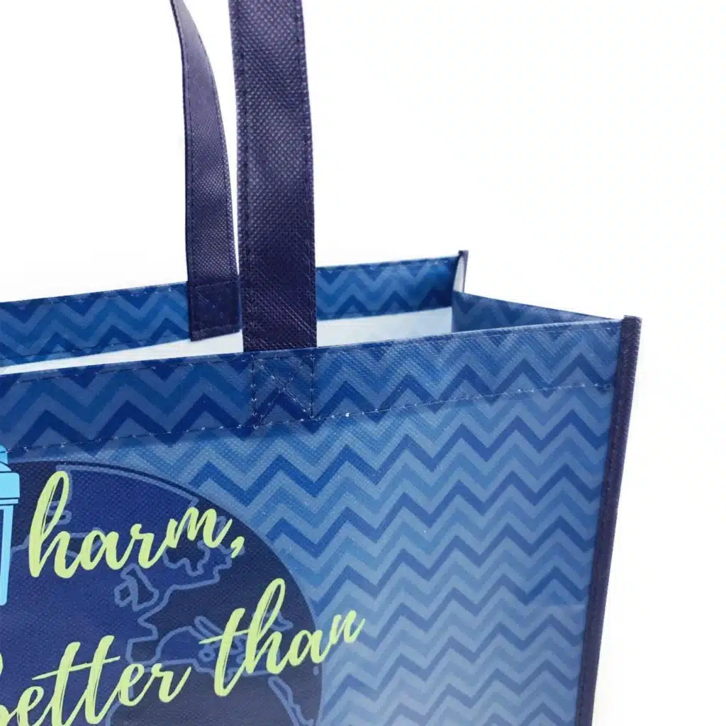 Blue non-woven shopping tote bag with custom printed design