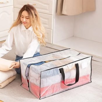 Clear large capacity moving bag with black handles for clothes and bedding storage, ideal for home organization and travel packing