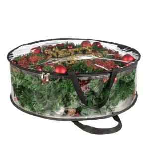Round transparent storage bag with black handles, filled with a decorated artificial Christmas wreath, ideal for holiday decoration storage and protection