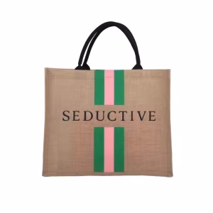 Eco-friendly jute shopping bag with black handles and printed Seductive text design.