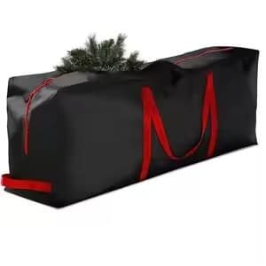 Large black storage bag with red handles, filled with artificial Christmas tree branches, ideal for holiday decoration storage and transportation